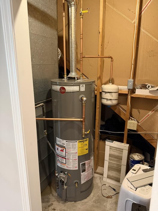 Rheem tank water heater installation with copper piping and expansion tank